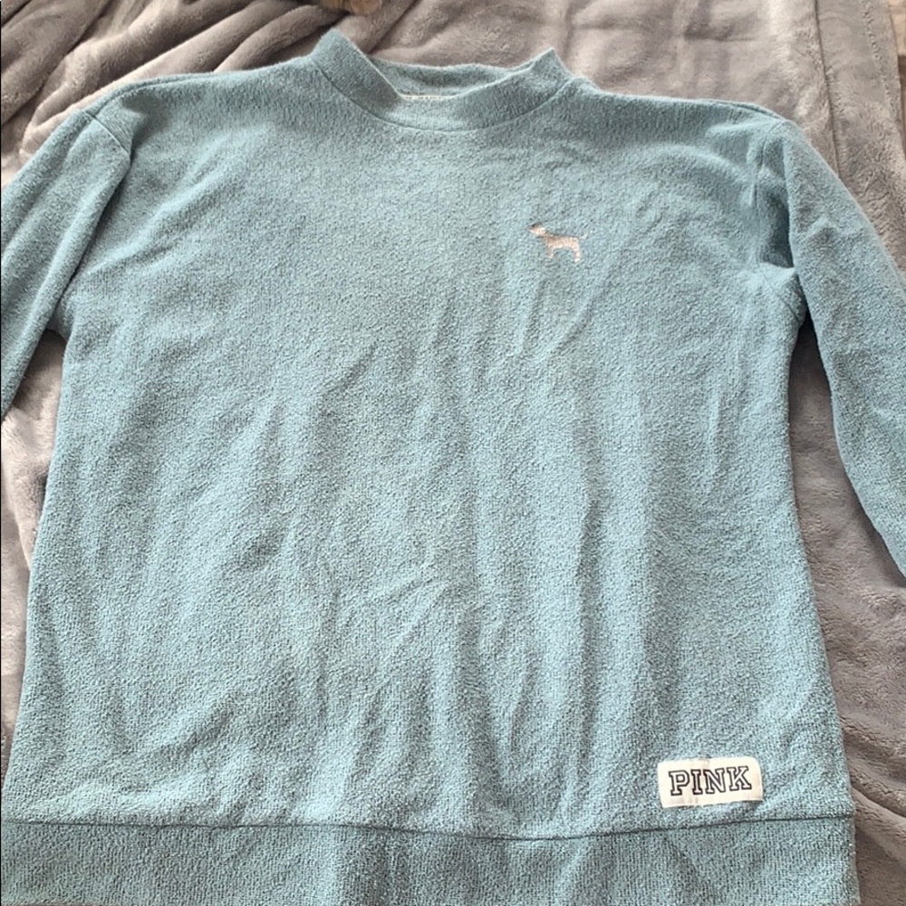 Pink sweater. Good condition.